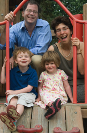Seth Pollack, Jenny Saffran, boy and girl on an outdoor a play set