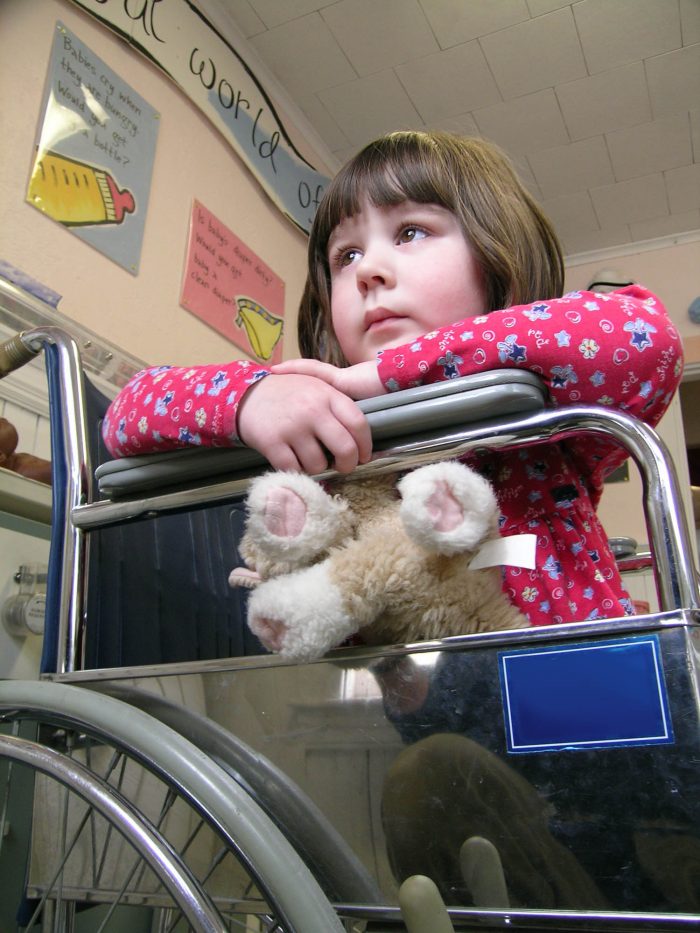 Young girl in wheelchair