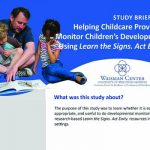Male child care provider reading story to two youth