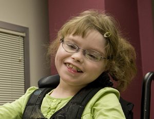 Young girl using AAC